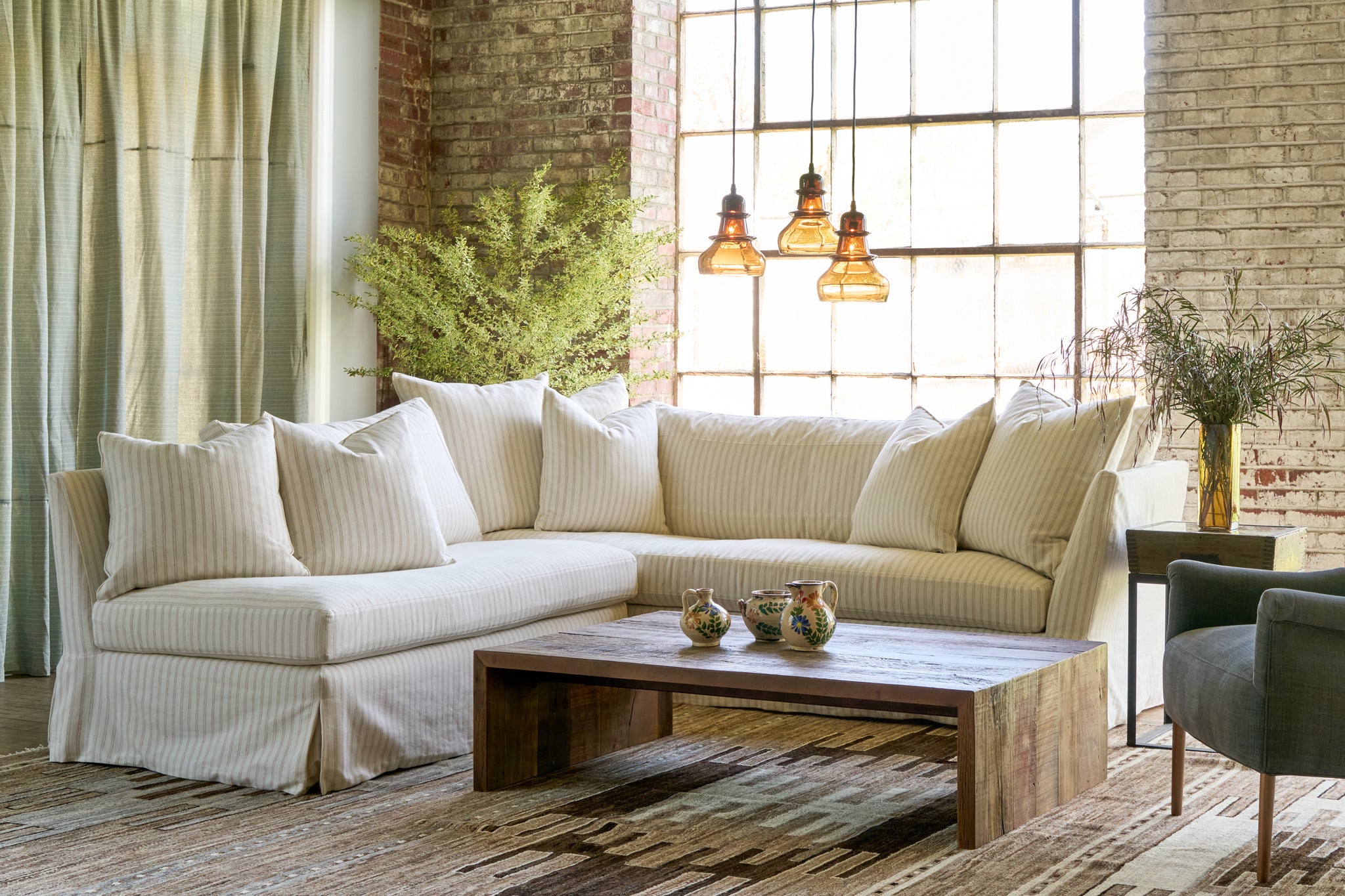  Striped sectional in front of a window. Photographed in Beach Ivory. 