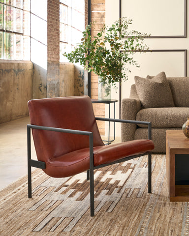 Leather in a room with a brown sofa on a brown rug. Photographed in Solvang Chianti.