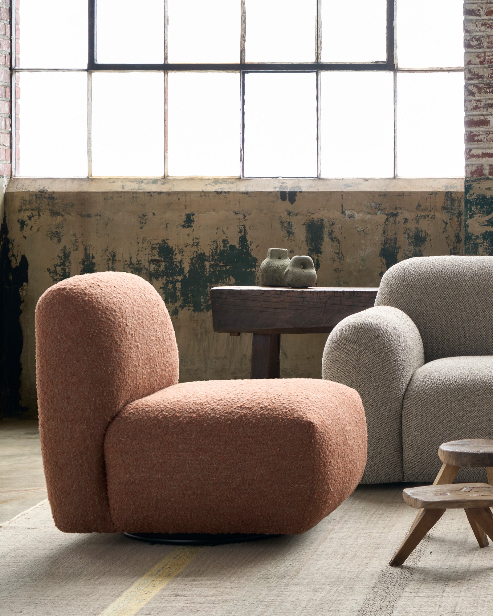  Armless chair with a swivel in front of a window and next to a sofa. Photographed in Knobby Canyon. 