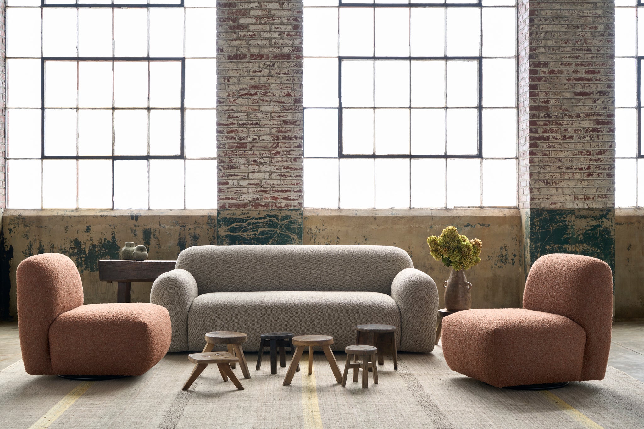  Armless chairs with a swivel in front of a window and next to a sofa. Photographed in Knobby Canyon. 