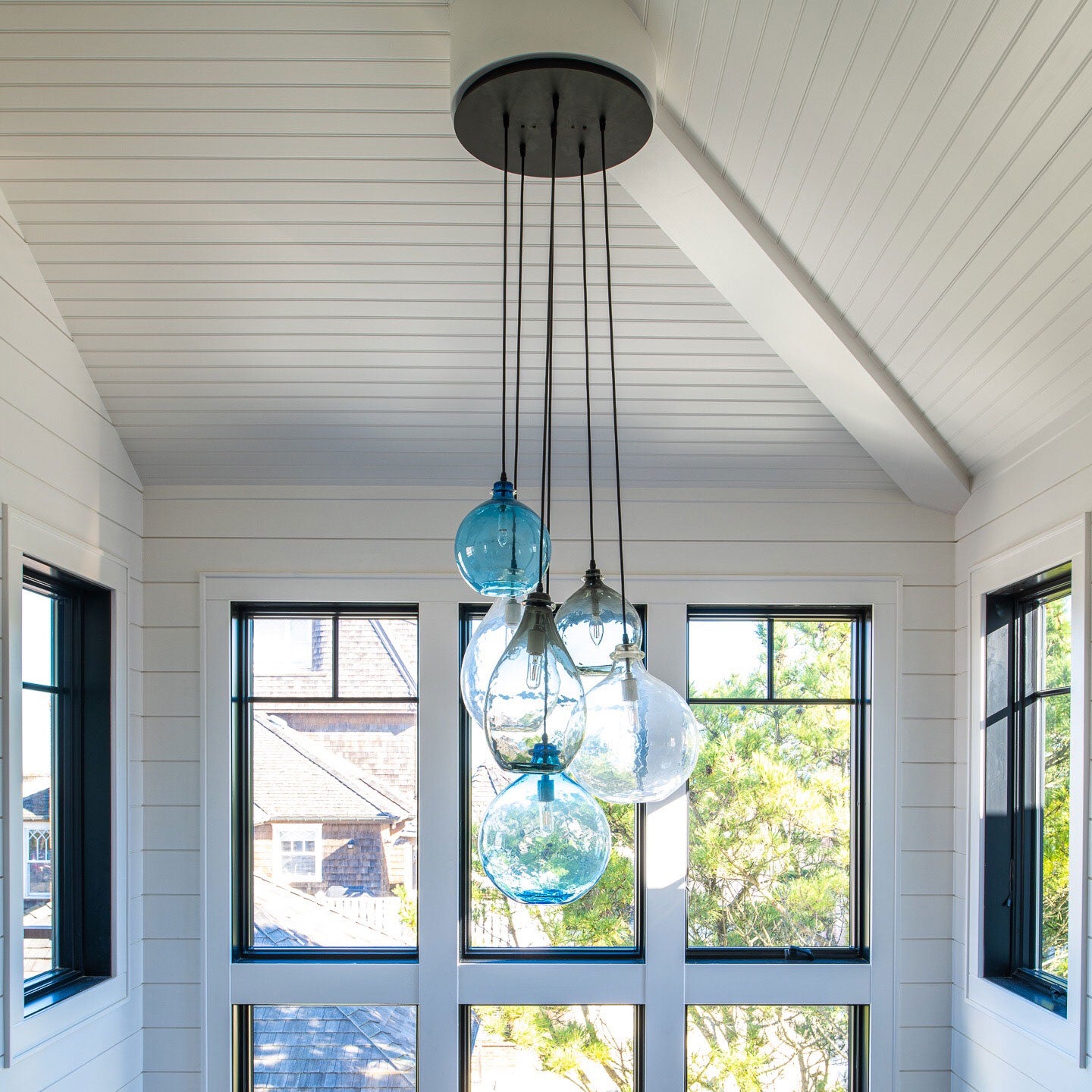  interior cieling shot of jug lamp glass pendants in cluster 
