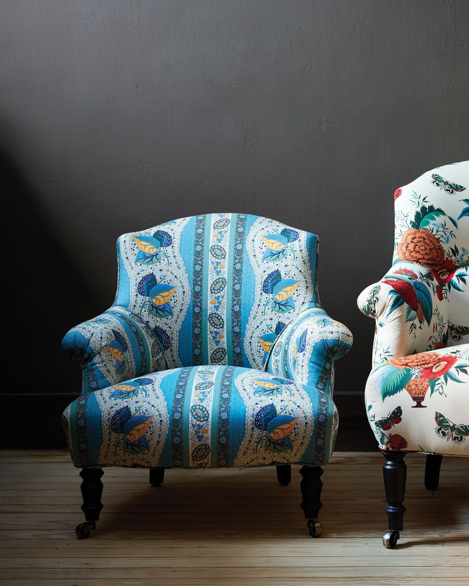  Chair in printed John Derian Fabric with a dark wall background. Photographed in John Derian Fabric. 