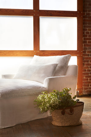  Light filled interior with Donato Double Chaise in Otis White detail shot. Photographed in Otis White. 